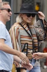 HOLLY WILLOGHBY Out with Husband and Friends Catching a Helicopter to Glastonbury 06/23/2023