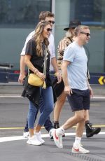 HOLLY WILLOGHBY Out with Husband and Friends Catching a Helicopter to Glastonbury 06/23/2023