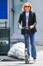JANE KRAKOWSKI Out on a Scooter in New York 06/20/2023