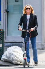 JANE KRAKOWSKI Out on a Scooter in New York 06/20/2023