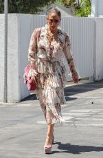 JENNIFER LOPEZ Slips Into a Bathtub at Kohler Store in Los Angeles 06/29/2023