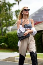 JOY CORRIGAN at a Photoshoot with a $1.3 Million Bugatti Veyron in Los Angeles 06/04/2023