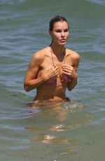 JOY CORRIGAN in Bikini at a Beach in Miami 06/10/2023
