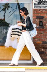 LAURA HARRIER Picking Up Some lLaundry at a Dry Cleaners in Los Feliz 06/03/2023