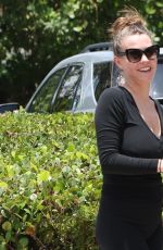 LAURA MULLER Arrives at a Doctor