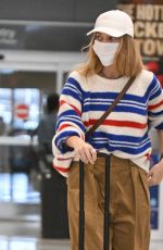 MARGOT ROBBIE Arrives at JFK Airport in New York 05/31/2023