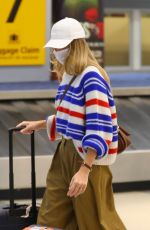 MARGOT ROBBIE Arrives at JFK Airport in New York 05/31/2023