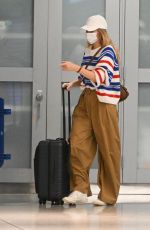 MARGOT ROBBIE Arrives at JFK Airport in New York 05/31/2023