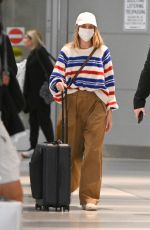 MARGOT ROBBIE Arrives at JFK Airport in New York 05/31/2023
