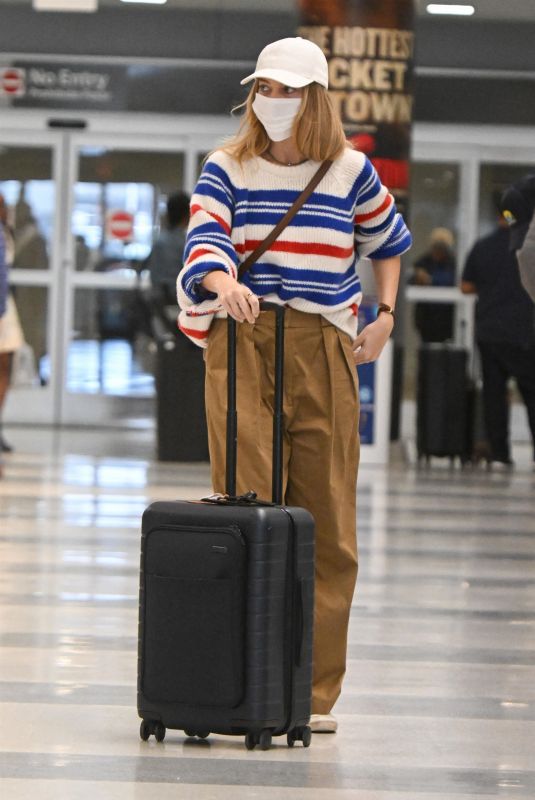 MARGOT ROBBIE Arrives at JFK Airport in New York 05/31/2023