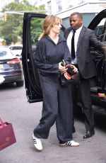 MAYA HAWKE in a Hooded Jumpsuit Out with a Friend in New York 06/15/2023
