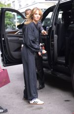 MAYA HAWKE in a Hooded Jumpsuit Out with a Friend in New York 06/15/2023