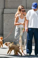 MILLIE BOBBY BROWN and Jake Bongiovi Out with Their Dog in New York 06/28/2023