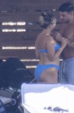 MOLLY MAE HAGUE in Bikini on Holidays with Tommy Fury and Their Baby in Athens 06/27/2023