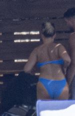 MOLLY MAE HAGUE in Bikini on Holidays with Tommy Fury and Their Baby in Athens 06/27/2023