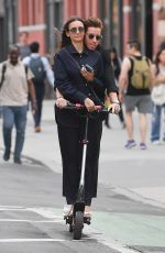 NINA DOBREV Rides a Scooter Out in New York 06/20/2023