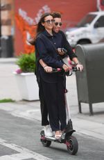 NINA DOBREV Rides a Scooter Out in New York 06/20/2023
