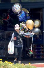 RENEE ZELLWEGER Shopping for Balloons and Party Supplies at Party City in Los Angeles 06/26/2023