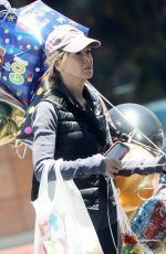 RENEE ZELLWEGER Shopping for Balloons and Party Supplies at Party City in Los Angeles 06/26/2023