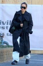 RITA ORA in a Black Trench Coat Out in Sydney 06/20/2023