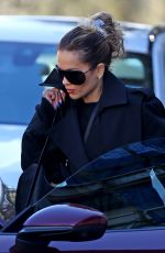 RITA ORA in a Black Trench Coat Out in Sydney 06/20/2023