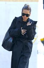 RITA ORA in a Black Trench Coat Out in Sydney 06/20/2023