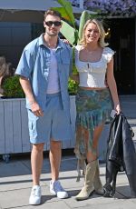 TASHA GHOURI and Andrew Le Page Leave sMenagerie Bar and Restaurant in Manchester 06/04/2023