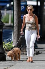 AMY ROBACH Out with Her Dog in New York 07/23/2023