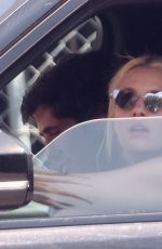 ASHLEY BENSON and Brandon Davis Out Driving in Los Feliz 07/02/2023