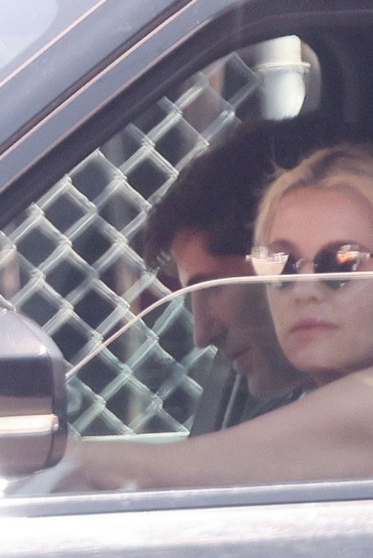 ASHLEY BENSON and Brandon Davis Out Driving in Los Feliz 07/02/2023