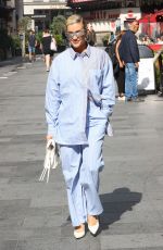 ASHLEY ROBERTS Arrives at Heart Radio in London 07/25/2023