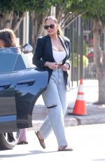 CHRISSY TEIGEN and Her Mom Out Shopping on Melrose Place in West Hollywood 07/08/2023