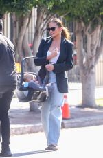 CHRISSY TEIGEN and Her Mom Out Shopping on Melrose Place in West Hollywood 07/08/2023