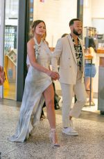 CHRISSY TEIGEN Arrives at John
