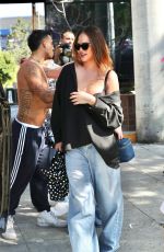 CHRISSY TEIGEN Leaves Beaches Only Club in West Hollywood 07/30/2023