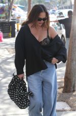 CHRISSY TEIGEN Leaves Beaches Only Club in West Hollywood 07/30/2023