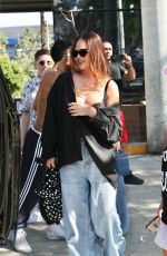 CHRISSY TEIGEN Leaves Beaches Only Club in West Hollywood 07/30/2023