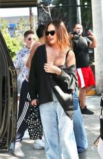 CHRISSY TEIGEN Leaves Beaches Only Club in West Hollywood 07/30/2023