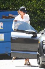 CHRISSY TEIGEN Out and About in West Hollywood 07/10/2023