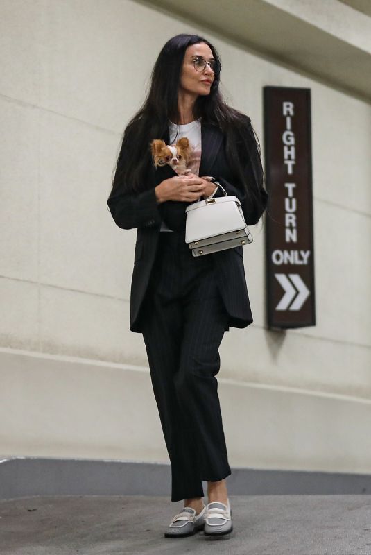 DEMI MOORE Arrives at Honor Titus’ Art Show in Beverly Hills 07/20/2023