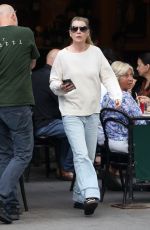 ELLEN POMPEO Waiting on a Park Bench at Bar Pitti in New York 06/30/2023