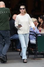 ELLEN POMPEO Waiting on a Park Bench at Bar Pitti in New York 06/30/2023