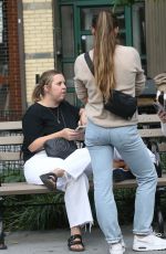 ELLEN POMPEO Waiting on a Park Bench at Bar Pitti in New York 06/30/2023