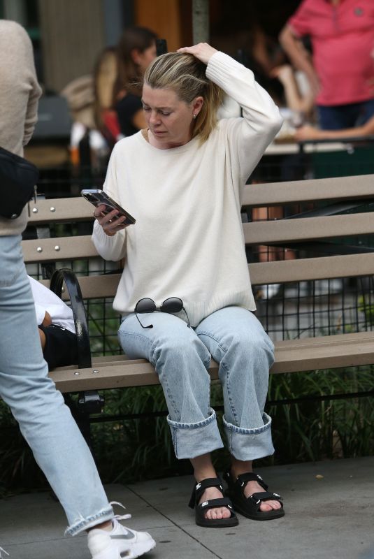 ELLEN POMPEO Waiting on a Park Bench at Bar Pitti in New York 06/30/2023
