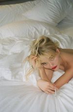 EMILY ALYN LIND at a Photoshoot, July 2023