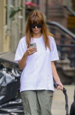 EMILY RATAJKOWSKI Walks Her Dog Out in New York 07/26/2023