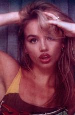 EMMA BROOKS at a Photoshoot 07/23/2023