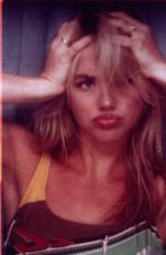 EMMA BROOKS at a Photoshoot 07/23/2023