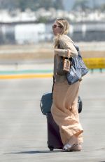 ESTE, DANIELLE and ALANA HAIM at an Airport in Los Angeles 07/07/2023