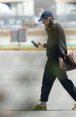 ESTE, DANIELLE and ALANA HAIM at an Airport in Los Angeles 07/07/2023